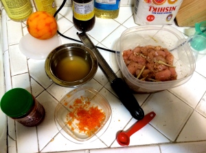 Not the best ingredients picture, I know. Orange zest, marinated chicken, cornstarch slurry, chili garlic sauce. Not pictured: scallions, tomato